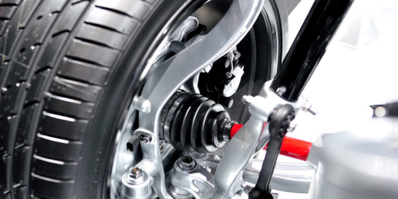 Car transmission. Front axle with suspension and absorber.